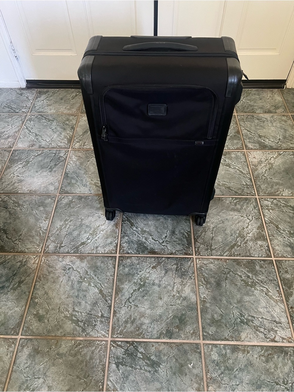 Tumi Black Carry-On Spinner Suitcase